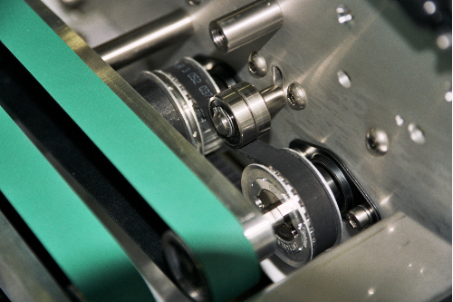 Pulley drive system with tensioner